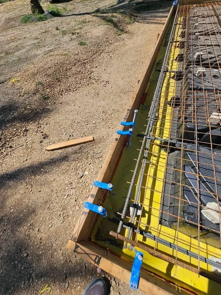 Post-tension cables laid over RPS void forms inside edge formwork